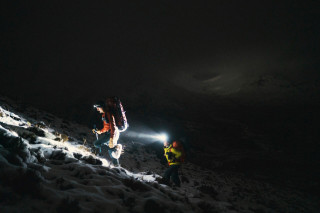 mountaineers-trekking-in-the-cold-night-at-glen-coe-scotland-3126627